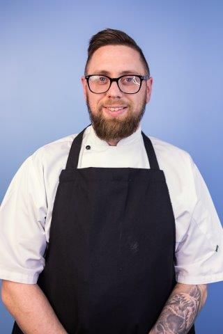 A chef wearing an apron