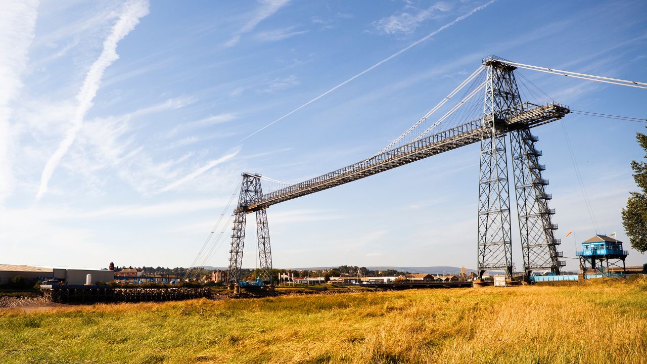 A chef frying food in a wok