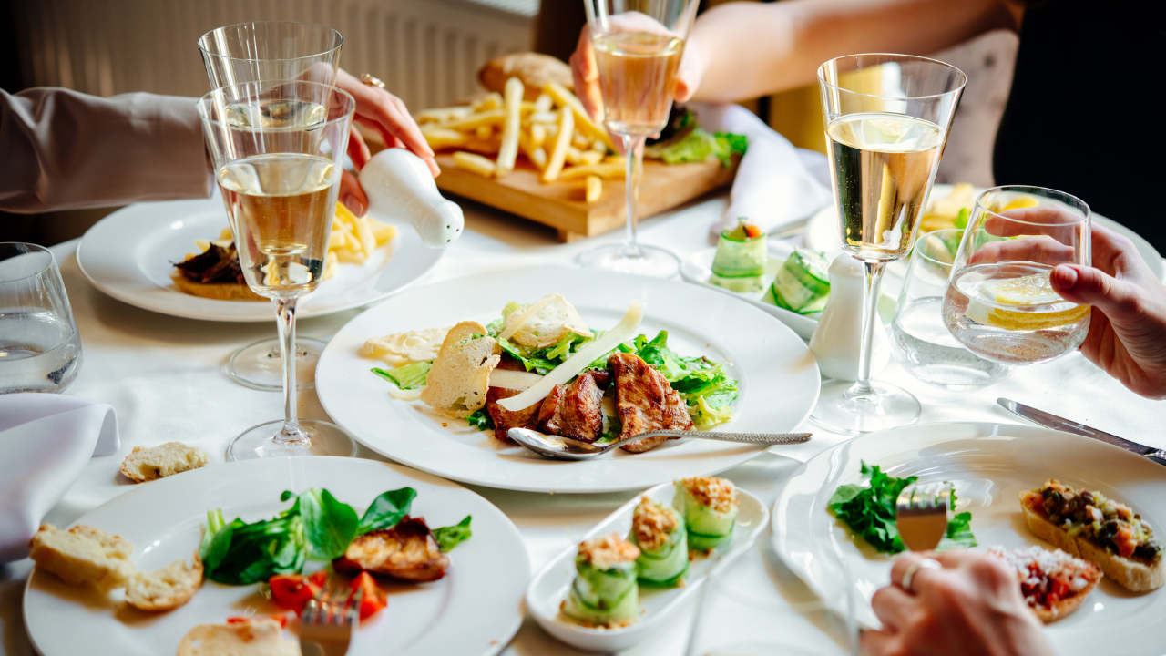 A chef frying food in a wok